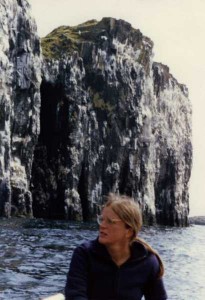 Cliffs at May Island, Susan at the helm.